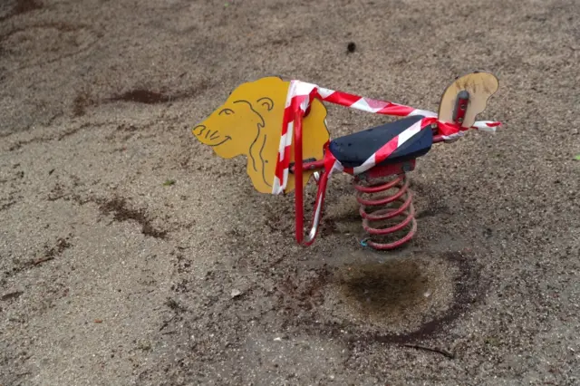 A playground ride taped up in Madrid