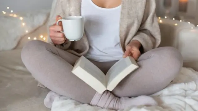 Stock image of a woman reading