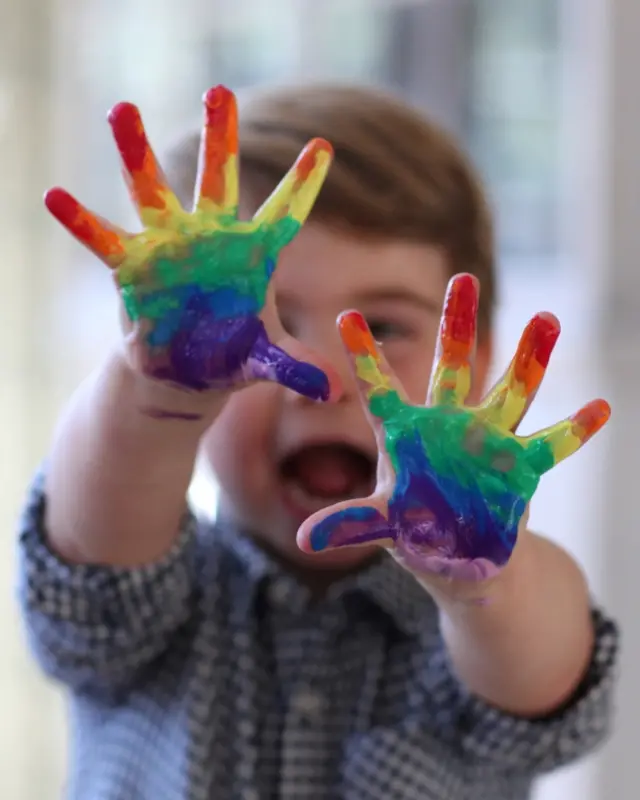 Undated handout photo released by Kensington Palace shows Prince Louis showing rainbow colours on his hand