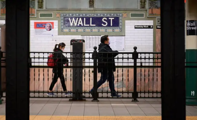 New Yorkers on an abandoned subway platform amid the Covid-19 outbreak