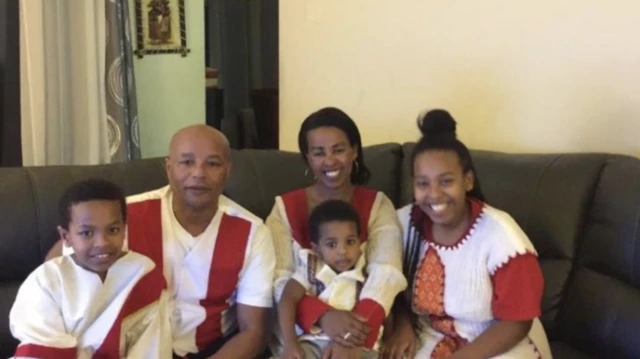 Wogene Debele, who died after contracting Covid-19, with her family