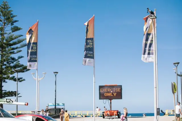 Social distancing sign reads 'Exercise Only' at Coogee Beach