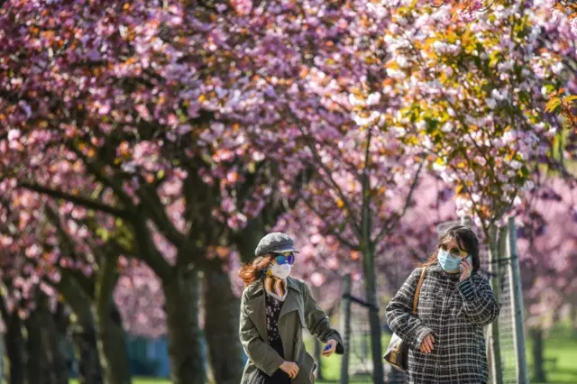 People wearing face masks in Edinburgh