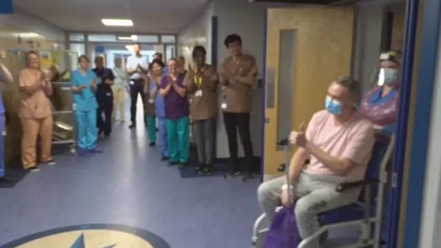 Nurse David Courtney-Williams was cheered after his recovery