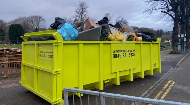Skip full of flood damaged goods in Appleby