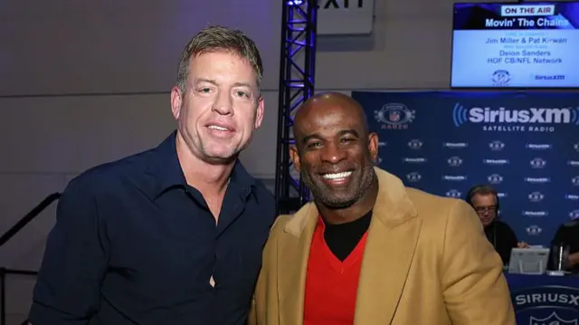 Troy Aikman with Deion Sanders in 2016