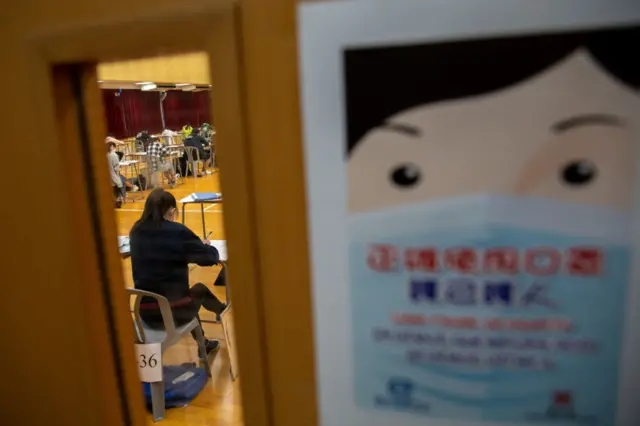 Students sit for the Diploma of Secondary Education (DSE) university entrance exams in Hong Kong