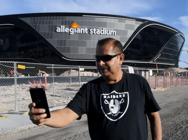 Raiders fan outside the team's new stadium in Las Vegas