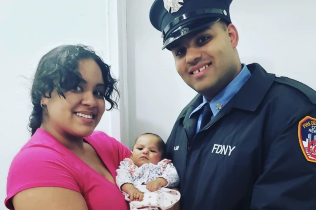 Jerel La Santa and Board of Education employee Lindsey La Santa and their infant daughter