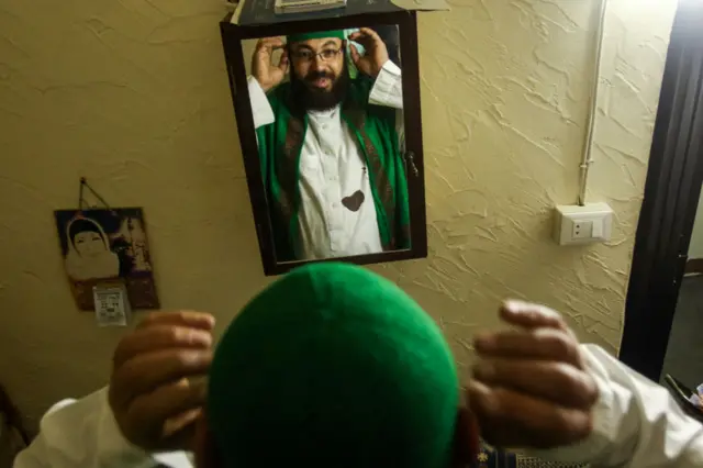 Mahmoud Fannas, a man who carries out the traditional role of a "Musaharati" or a "Ramadan drummer" who awakens Muslims for the pre-dawn traditional "Suhur" meal