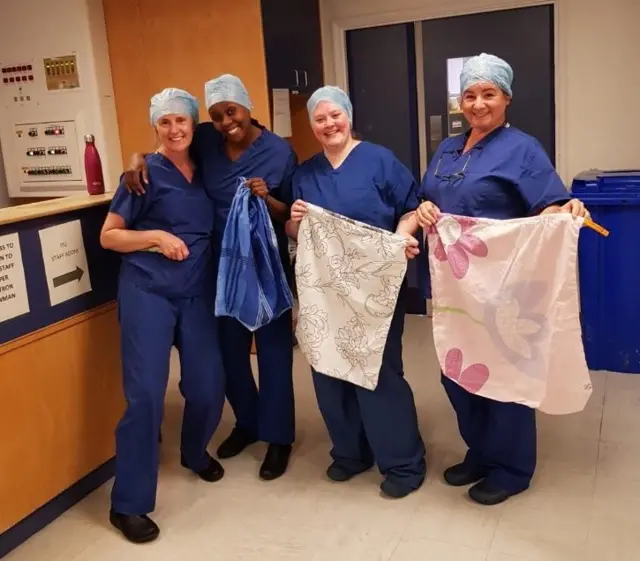 Nurses with donated bags from the Birmingham Repertory Theatre