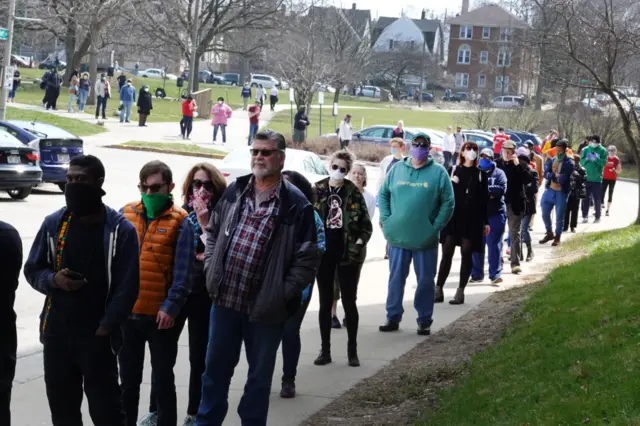 In Milwaukee, only five polling sites remained open out of 180, causing long queues of voters