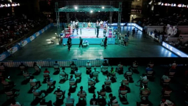 Spectators at a Nicaraguan boxing event sat apart to stay socially distant