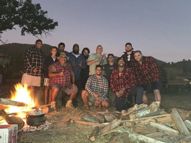 Group picture of NRL players and friends