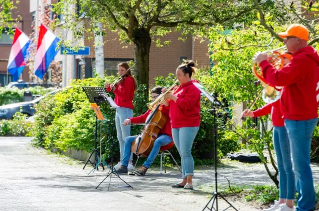 Dutch musicians play on the street on King's Day