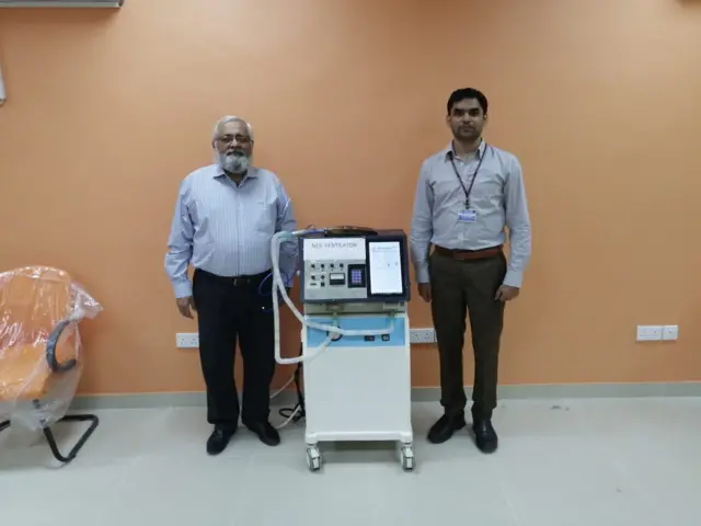 Dr Riazuddin (right) with his prototype ventilator