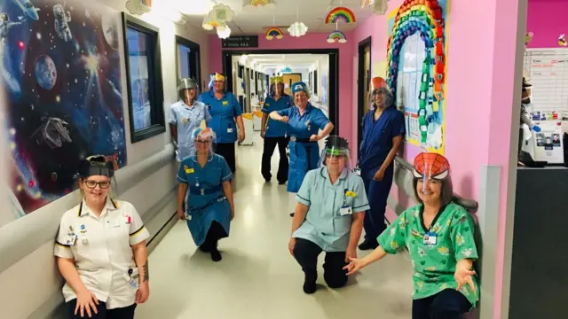 Staff wearing the visors