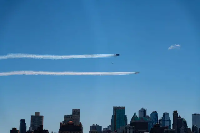 The US Navy's Blue Angels and US Air Force's Thunderbirds perform a flyover tribute to honor NYC COVID-19 frontline workers during the COVID-19 pandemic on 28 April, 2020 in New York City.