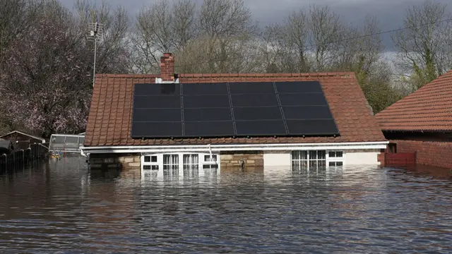 Bungalow under flood water