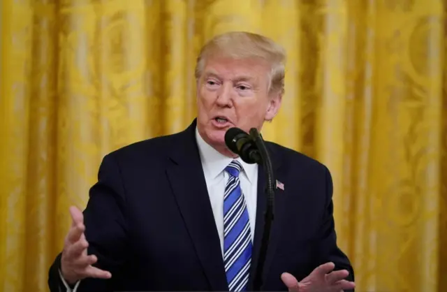 US President Donald Trump speaks in the East Room of the White House in Washington, DC, on April 28