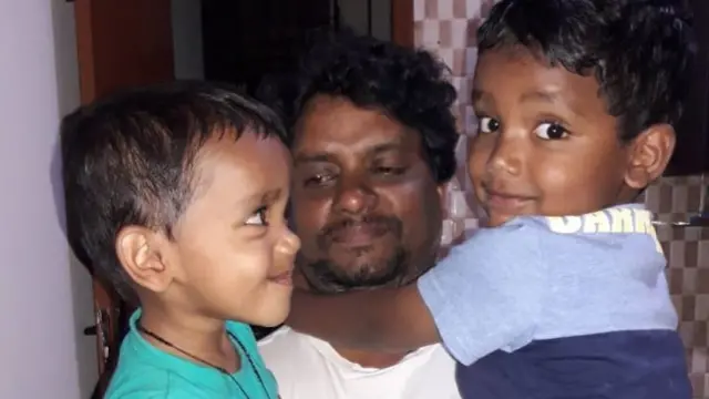 Rajesh Jayaseelan with his two young children