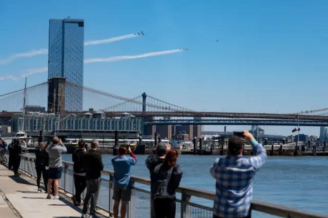 The Navy's Blue Angels and Air Force's Thunderbirds perform a flyover tribute to honor NYC COVID-19 frontline workers during the COVID-19 pandemic on 28 April, 2020 in New York City