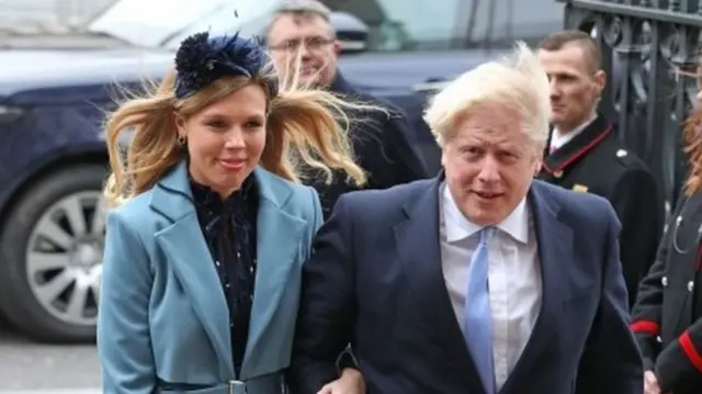 Carrie Symonds and Boris Johnson attending a church service in March