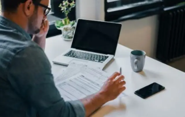 Stock image of a businessman at his desk