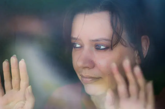 woman at window