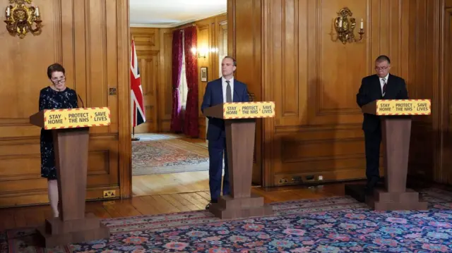 Left to right: Prof Yvonne Doyle, Dominic Raab, and Prof Jonathan Van Tam