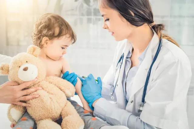 Child being vaccinated