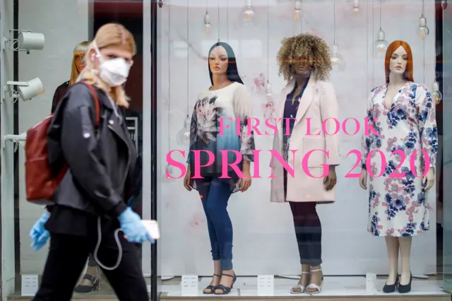 Woman wearing facemask in London