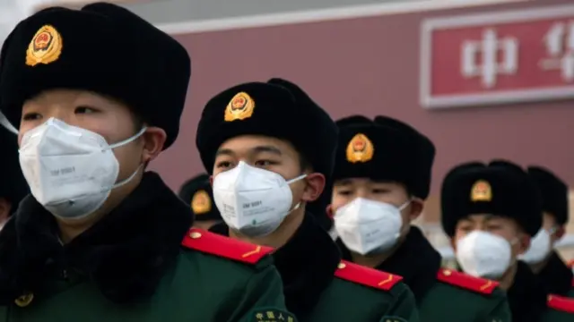 Chinese police with face masks