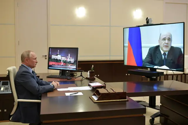 Russia's President Vladimir Putin holds a meeting with Prime Minister Mikhail Mishustin via video link