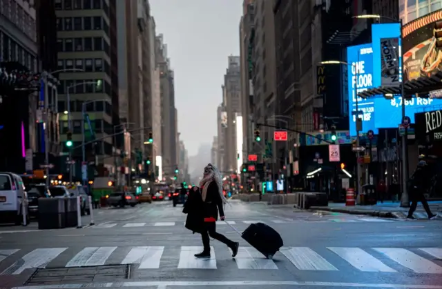 Woman in Times Square, NYC, on 30 April