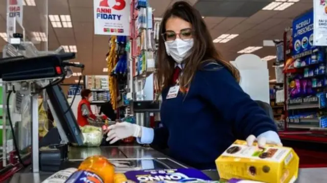 A supermarket checkout in Milan under lockdown