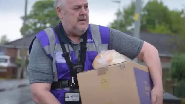 Parcel being delivered