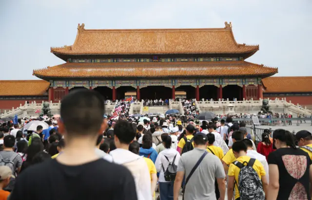 Tourists visit the Forbidden City on July 7, 2019 in Beijing, China.