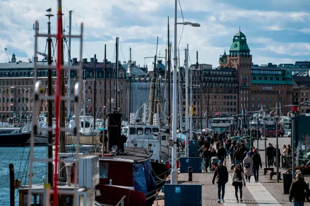 Images of crowds are surprising now when we are used to seeing empty city streets - this picture is from Sweden, which has not introduced a lockdown