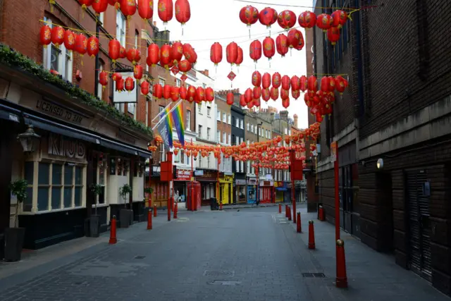 Normally crowded Chinatown in London is quiet on a weekend when the government instructed people to stay home
