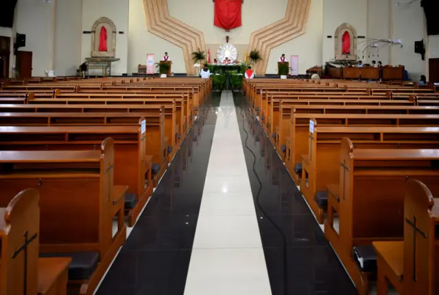 Mass performed in church in Jakarta, seen from a distance