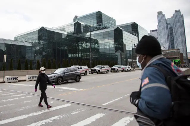 A postal workers delivers mail near the Javits Center