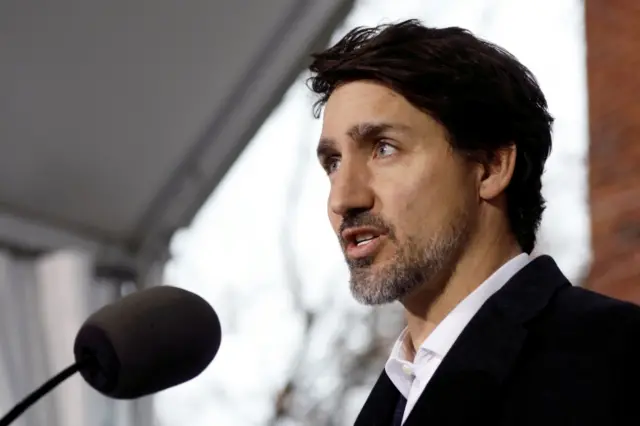 Canada's Prime Minister Justin Trudeau speaks during a news conference outside Rideau Cottage on 29 March