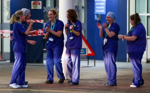 NHS staff joining in the now-weekly applause