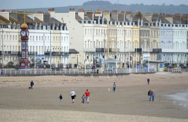 Some observers pointed out that exercising while social distancing is permitted by the government - and many areas were less crowded than usual, including this beach in Weymouth on Sunday