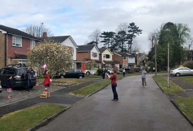 Neighbours sing happy birthday to Zara in Potters Bar, Hertfordshire