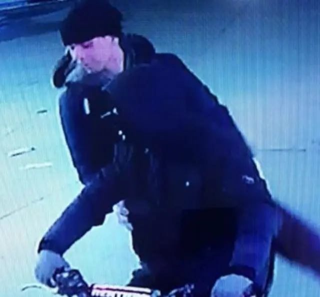 CCTV image of men on motorbike