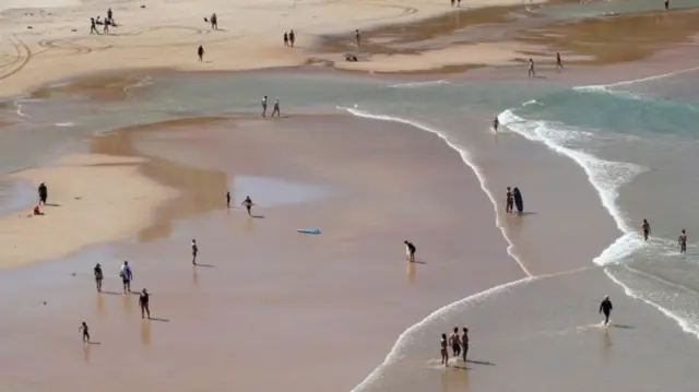 People at Freshwater Beach in Sydney