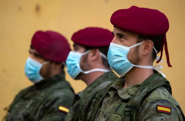 Spanish soldiers in Valencia wearing face masks