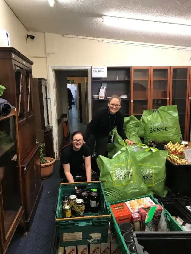 People sorting food parcels